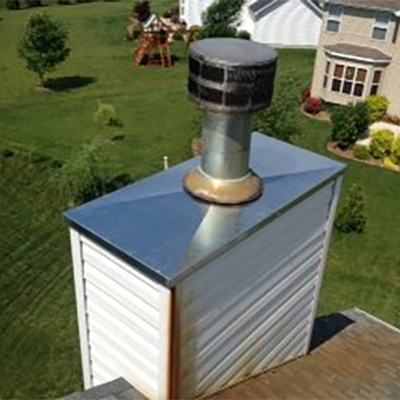 Top view of Chimney being serviced and repaired